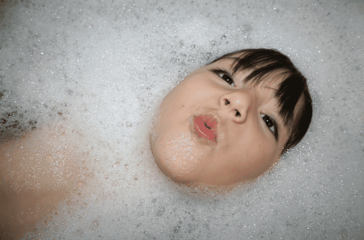 girl taking a bubble bath